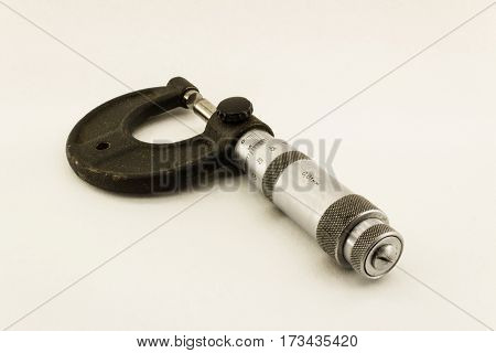 Close up of micrometer isolated on white background