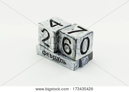 Desktop perpetual calendar in cyrillic isolated on white background