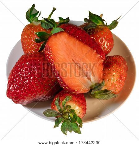 Strawberries on a white plate, isolated background
