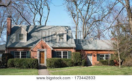 Country Cape Cod House with Gray Trim