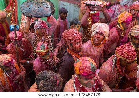 Nandgaon, India - March 18, 2016: Barsana villagers come to Nandgaon village to celebrate Lathmar Holi in Nandgaon, Uttar Pradesh, India.