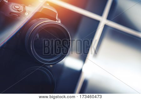 Photography Business Concept. Modern Digital Camera in the Photo Studio. Closeup Photo. 85mm Portrait Lens.