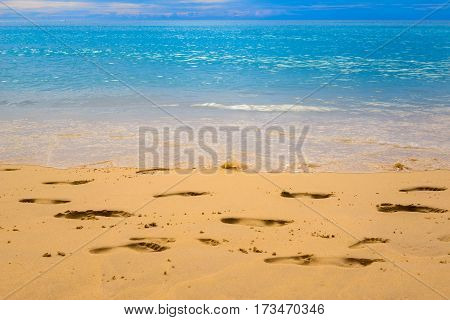 close up Footmark in the Sand on Beach at Thailand