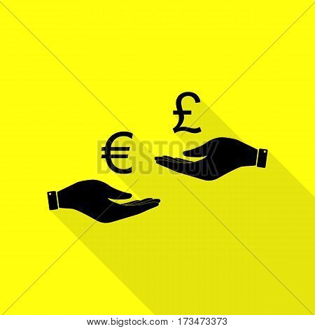 Currency exchange from hand to hand. Euro and Puond. Black icon with flat style shadow path on yellow background.