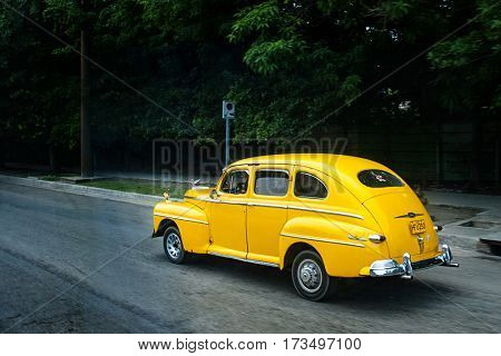 HAVANA, CUBA - July 11, 2006: A vintage 1950's American Ford car in Havana. It is believed that 60,000 US cars from pre-embargo age are still in use in Cuba.