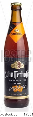 GRONINGEN, NETHERLANDS - FEBRUARY 24, 2017: Bottle of Schofferhofer german dark wheat beer isolated on a white background
