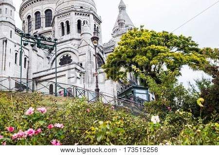 Close-up of Basilica Sacre Coeur on Montmartre hill in summer Paris France.