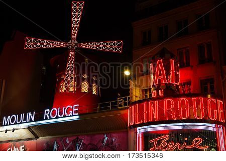 PARIS FRANCE - SEPTEMBER 19: Cabaret Moulin Rouge by night. French landmarks and travel destinations concept.