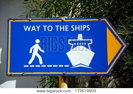 Blue way to the ships sign in the port Heraklion Crete Greece Europe.