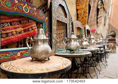 Decorative elements on the souk (market) in the old town Medina in Morocco. Jug for brewing the tea.