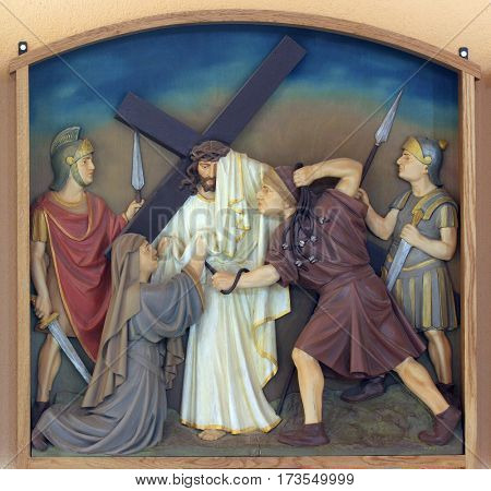 BUDASEVO, CROATIA - NOVEMBER 05: 6th Stations of the Cross, Veronica wipes the face of Jesus, Church of the Blessed Aloysius Stepinac in Budasevo, Croatia on November 05, 2007