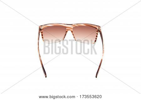 sunglasses with brown glasses isolated background. no people