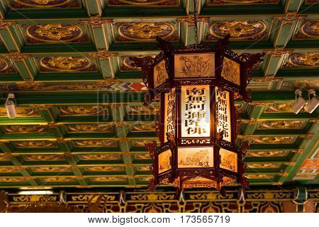 The beautiful of chinese lanterns hanging on ceiling decorated with chinese art style.