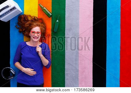 Girl Lying On The Carpet