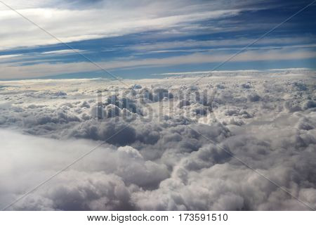 clouds seen from an airplane sun sunshine