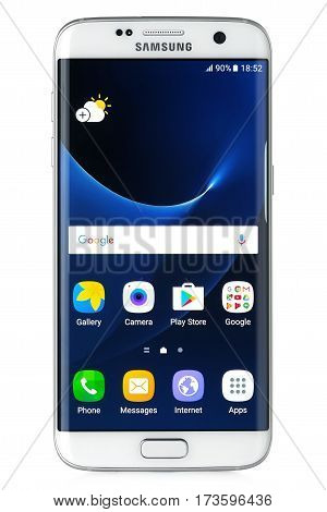 Koszalin, Poland - February 27, 2016: Photo of Samsung Galaxy S7 Edge white pearl. Samsung 7 Edge are new generation smartphone from Samsung. The Samsung S7 Edge is smart phone with multi touch screen