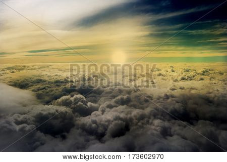 clouds seen from an airplane sun sunshine