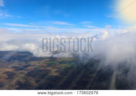 clouds seen from an airplane sun sunshine