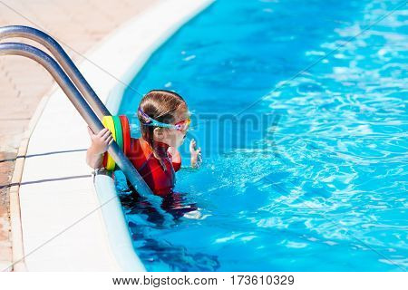 Little Girl In Swimming Pool