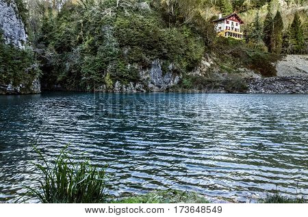 A beautiful waterfall in the heart of the gorges of Kakuetta in the Pyrenees Atlantiques. A little away from the path since it will be necessary to go under a bridge to see it from this angle of view.