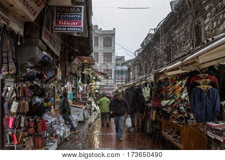 ISTANBUL TURKEY - DECEMBER 30 2015: Snow storm hitting a typical Istanbul street near the Spice market
