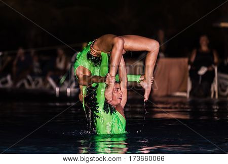 Cayo Coco island, Memories Caribe resort, Cuba, July 3, 2016, stunning gorgeous, amazing performance of hotel entertainment team at night spectacular water show