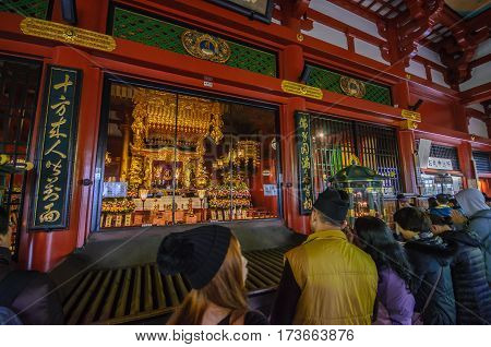 Tokyo Japan - November 19 2016 : Inside the main hall of Senso-ji Temple in Asakusa Tokyo Japan . The Senso-ji Temple in Asakusa is the most famous temple in Tokyo .