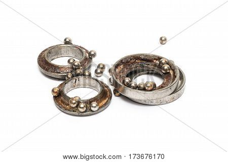 broken ball bearing on isolated white background
