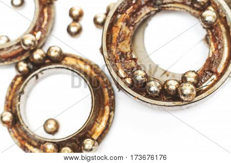broken ball bearing on isolated white background