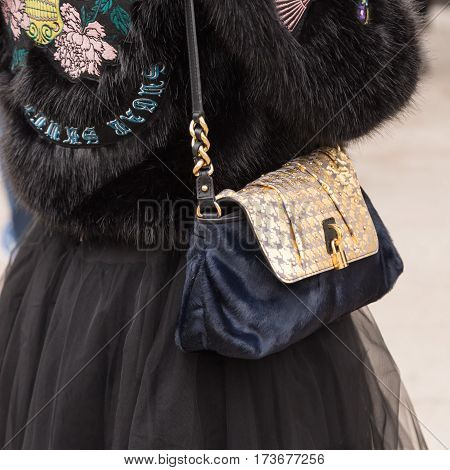 MILAN ITALY - FEBRUARY 23: Detail of bag outside Genny fashion show during Milan Women's Fashion Week on FEBRUARY 23 2017 in Milan.