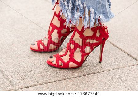 MILAN ITALY - FEBRUARY 23: Detail of shoes outside Genny fashion show during Milan Women's Fashion Week on FEBRUARY 23 2017 in Milan.