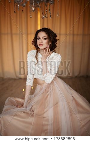Young bride in a luxurious wedding dress