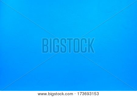 Blue pastel color paint on cement wall Texture background.