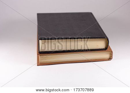 Two books on a white background isolated