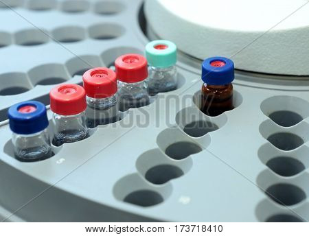 Quality Control Laboratory Medicine. Chromatograph Operation. Bottles Check On The Quality Of The Su