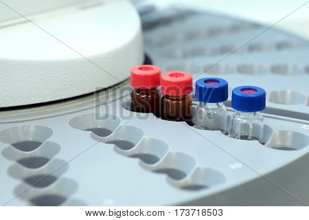 Quality Control Laboratory Medicine. Chromatograph Operation. Bottles Check On The Quality Of The Su