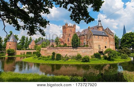 S'HEERENBERG, GELDERLAND/ THE NETHERLANDS - JUNI 4,2016:View of the historical castle Haus Berg in a sunny summer day