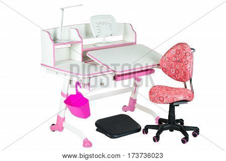 Pink chair pink school table pink basket desk lamp and black support under legs on the white isolated background.