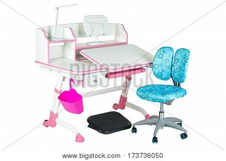 Blue chair pink school table pink basket desk lamp and black support under legs on the white isolated background.