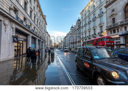 London UK - February 27 2017: People and tourists visiting st James street at picadilly circus on after a stormy afternoon