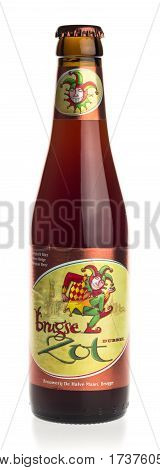 GRONINGEN, NETHERLANDS - FEBRUARY 24, 2017: Bottle of Brugse Zot Dubbel beer isolated on a white background