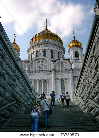 Moscow, Russia - August 25, 2016: Golden domes of the Cathedral of Christ the Savior against the blue sky. Summer. The orthodox architecture. Moscow, Russia