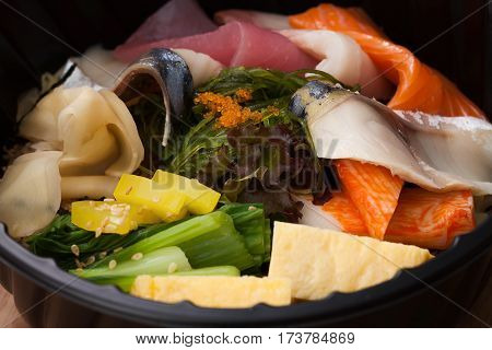 Japanese Food Tekka Don Take Away On Wooden Background
