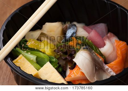 Japanese Food Tekka Don Take Away On Wooden Background