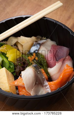 Japanese Food Tekka Don Take Away On Wooden Background