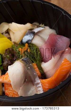 Japanese Food Tekka Don Take Away On Wooden Background