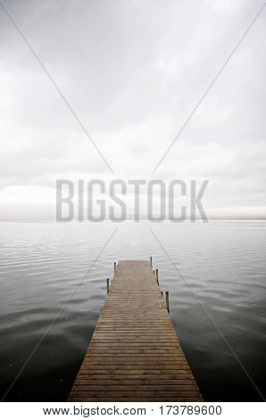 View of a wooden pier in Albufera lake, Valencia, Spain.