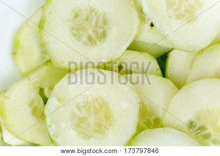 Sliced Cucumbers On The Plate, Macro Close Up Flat Lay.