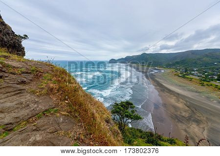 View of Piha beach in New Zealand from the slopes of Lion's rock