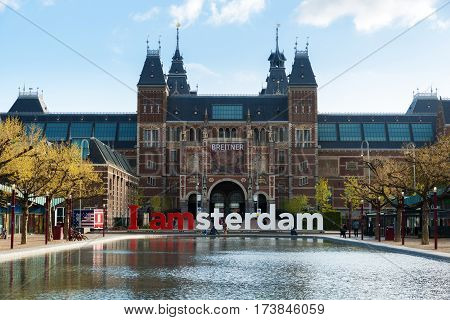 Amsterdam Netherlands - May 03 2016: The Rijksmuseum Amsterdam museum area with the words IAMSTERDAM in Amsterdam Netherlands.